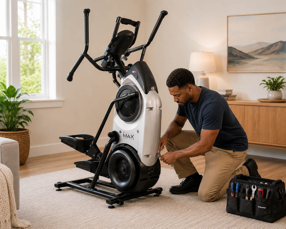 Man assembling a boxflex max trainer machine in a home setting