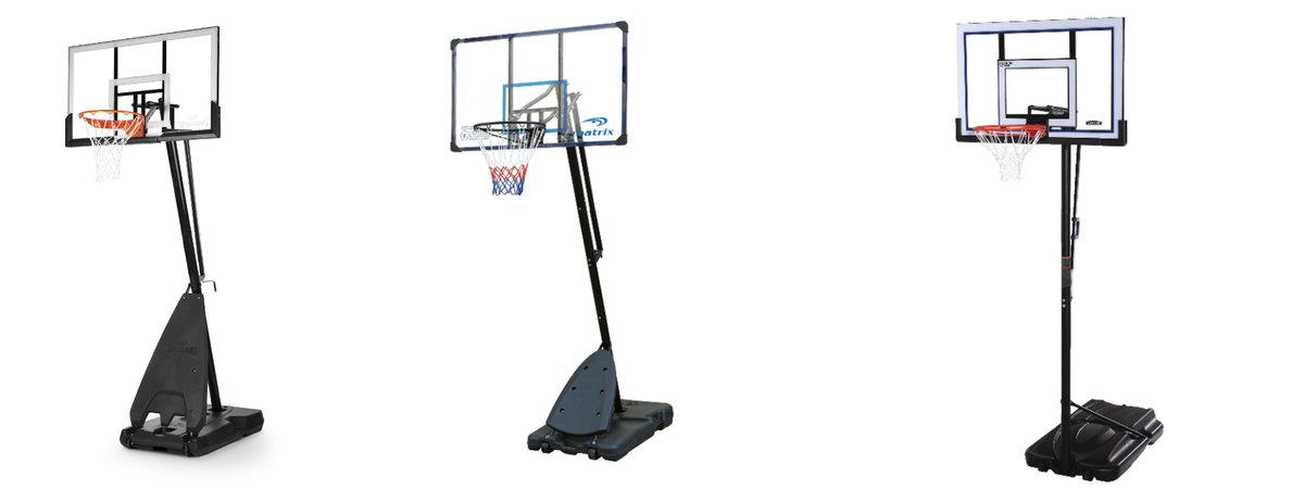 Three basketball hoops on stands with backboards against a white background